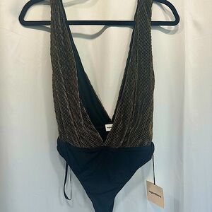Superdown size small black and gold shimmer bodysuit.